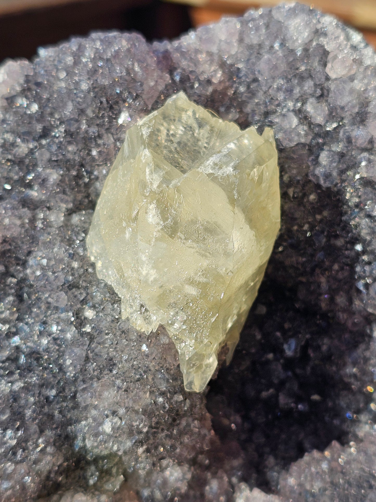 Calcite on violet Brazilian amethyst