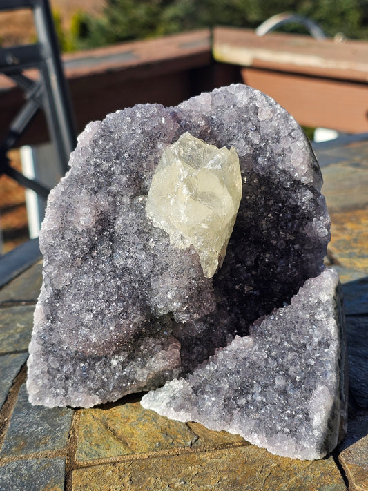 Calcite on violet Brazilian amethyst