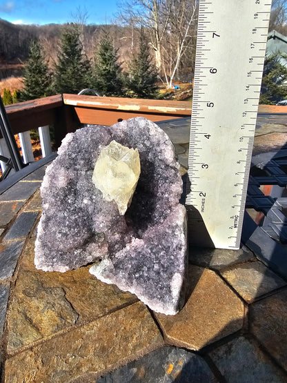 Calcite on violet Brazilian amethyst