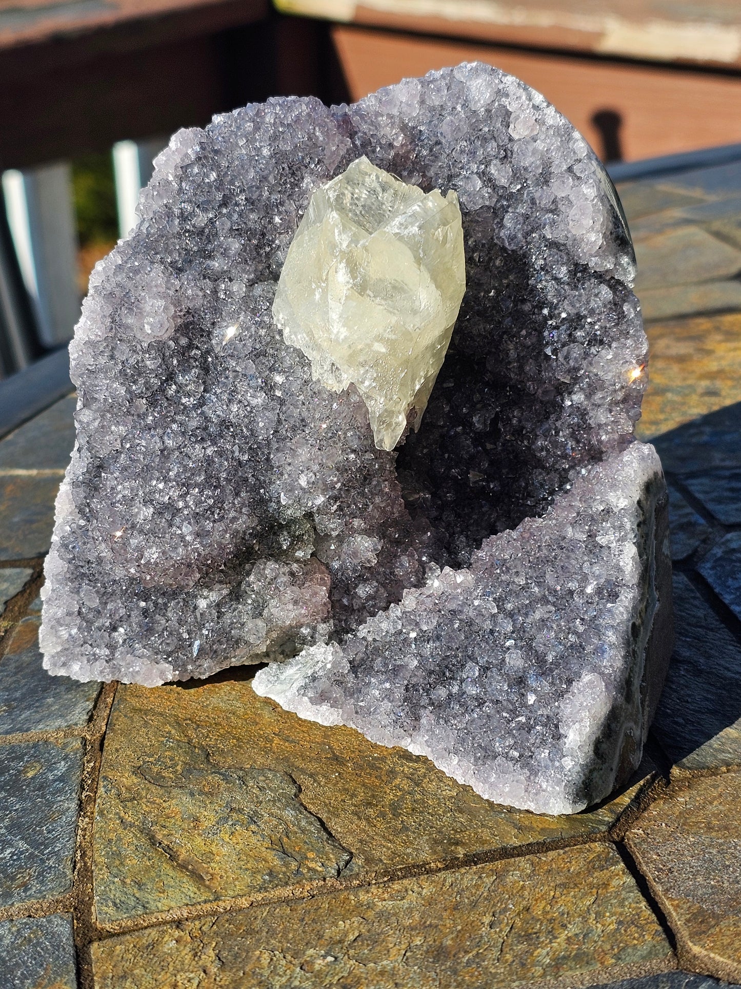 Calcite on violet Brazilian amethyst