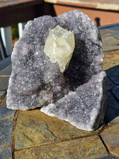 Calcite on violet Brazilian amethyst